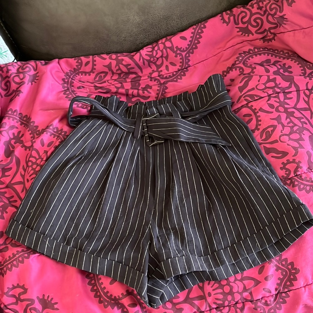 Size 6 Nunui short. Navy blue with white pin stripes